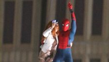 Spidey hangs from a helicopter in 'Spider-Man: Homecoming' set photos and video